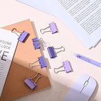 Temiary Aesthetic Binder Clips, 24 Pcs 1.6 Inches Small Metal Binder Clip with Clear Storage Container, Binding Paperwork Clamps for School Teachers Office Supplies (Purple)